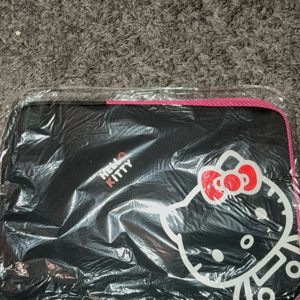 Hello Kitty Black Sleeve with Pink Trim and Red Bow